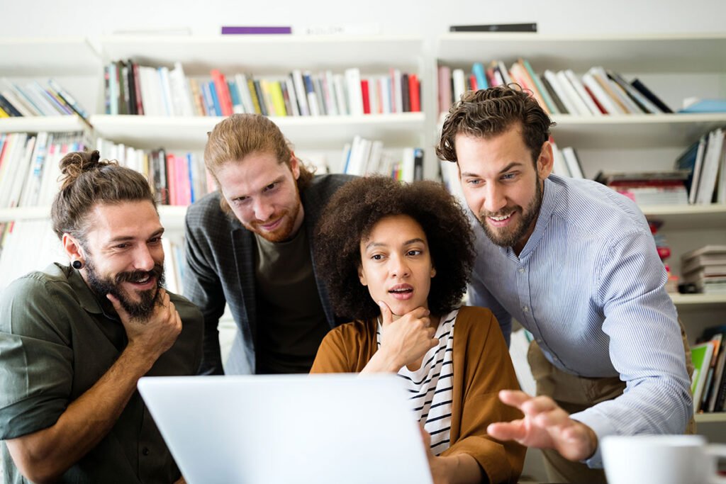 Team working together at a laptop